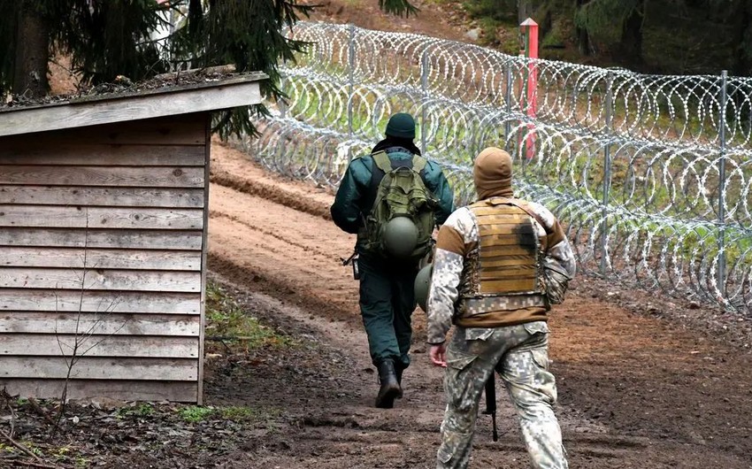 Belarus reports 12 dead refugees on border with Latvia