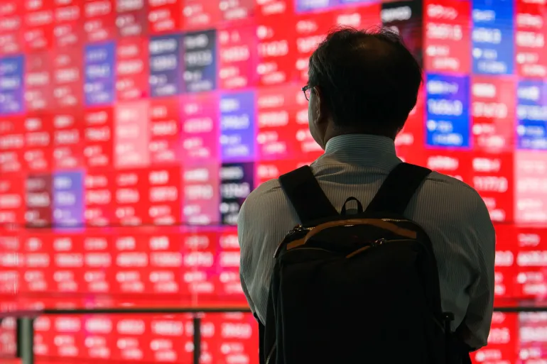 Stocks retreat from record highs after US strikes on Iran