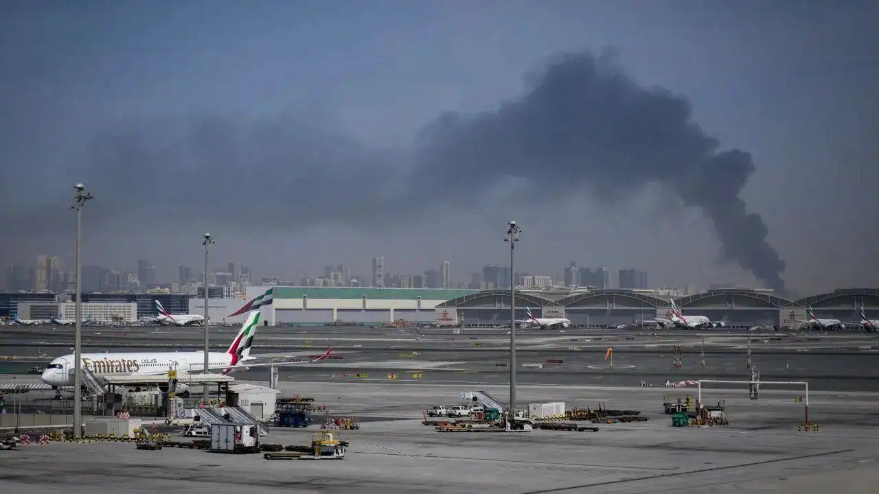 Kuwait suspends flights after Iran attacks on airport wounds several