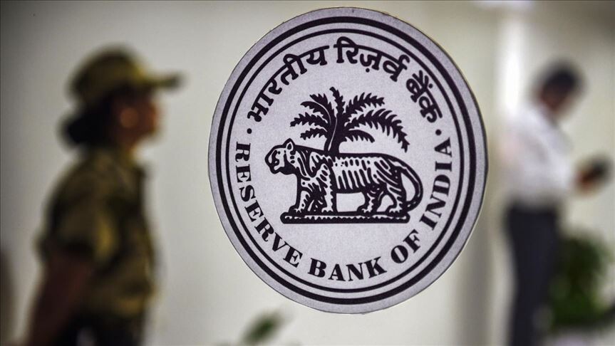 India’s central bank keeps policy rate steady, cuts growth outlook amid energy price risks