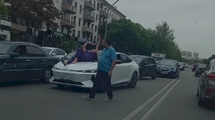 DİN-dən maşının üzərinə uzanan qadınla bağlı AÇIQLAMA