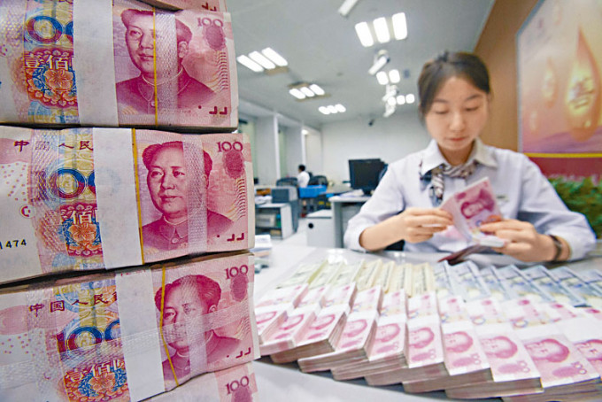 China keeps key lending rates unchanged for 13th month