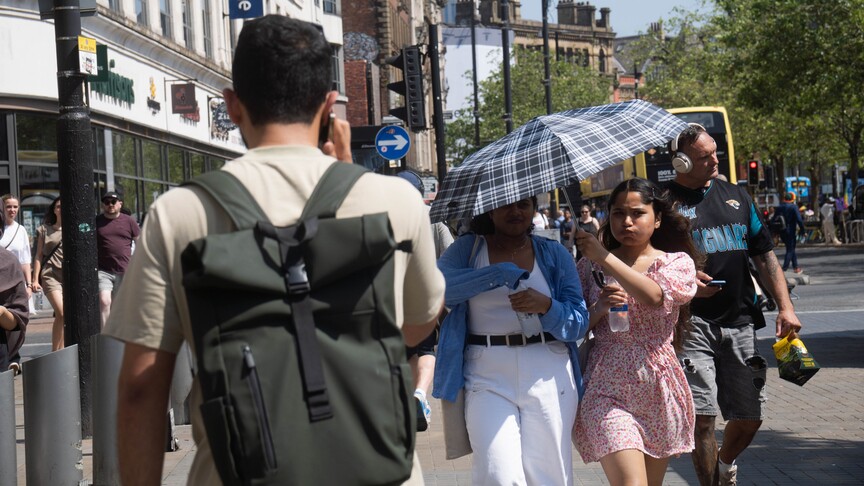 UK battles record heat as hospitals, emergency services come under strain