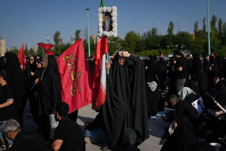 What do the red flags at Khamenei’s funeral mean?