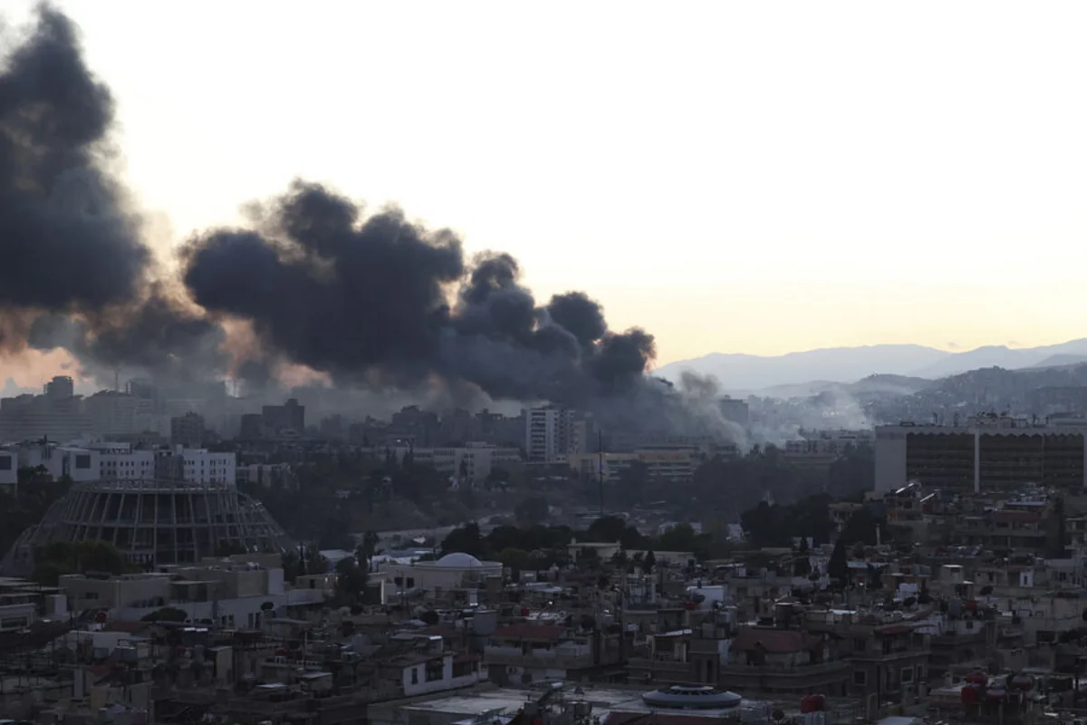 Explosions reported near hotel hosting Macron in Damascus