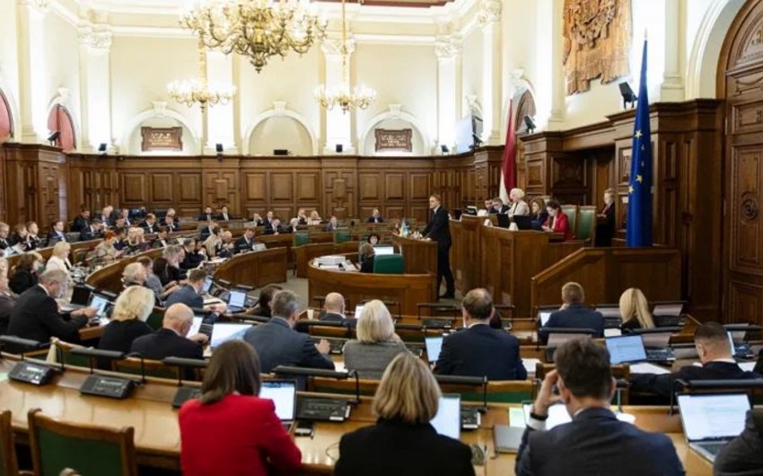 Latvian parliament approves harsher punishments for crimes against state