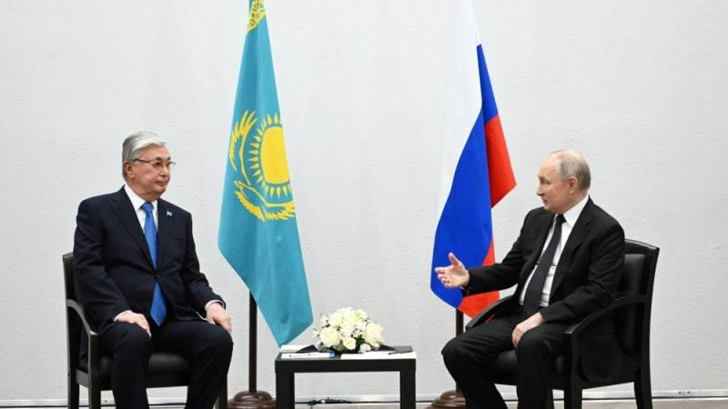 Vladimir Putin holds talks with his Kazakh counterpart