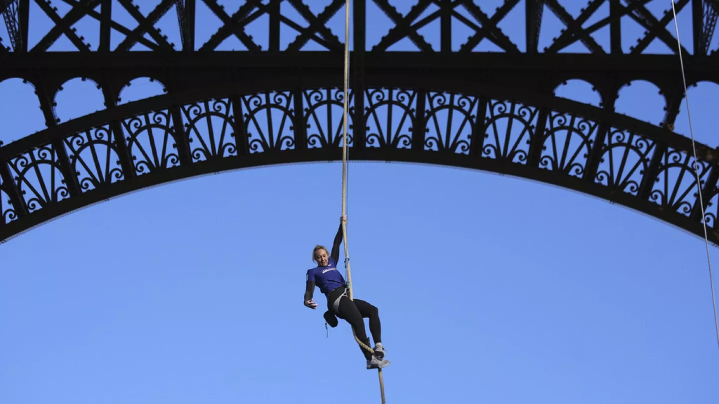 French woman breaks world rope climbing record with Eiffel Tower climb