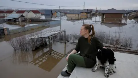Russia floods leave houses almost submerged