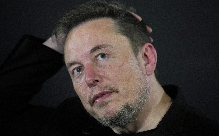 Elon Musk kicks off surprise trip to Beijing