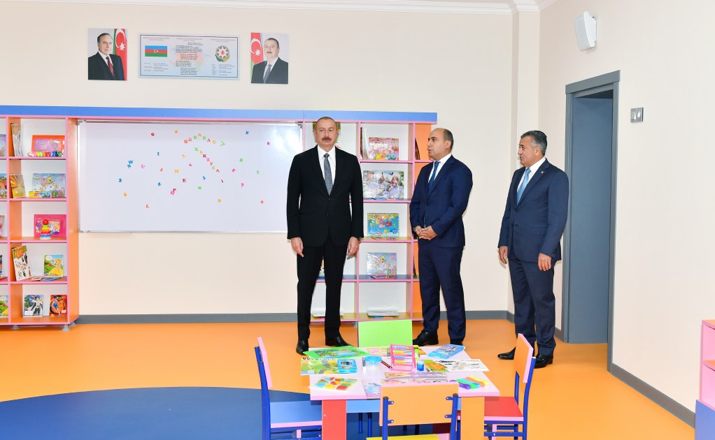 İlham Əliyev yeni məktəb binasının açılışında iştirak edib