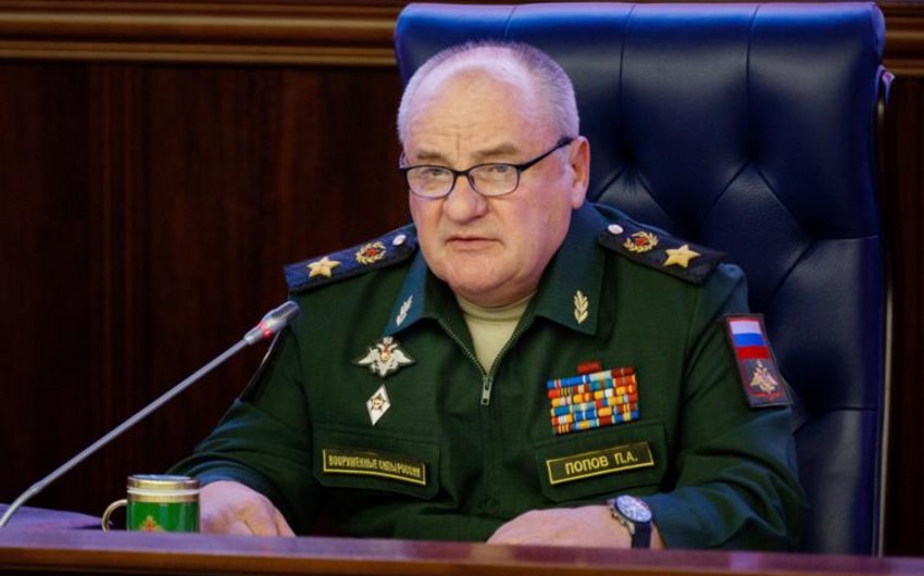 Russia charges former deputy defense minister with fraud, illegal arms trafficking