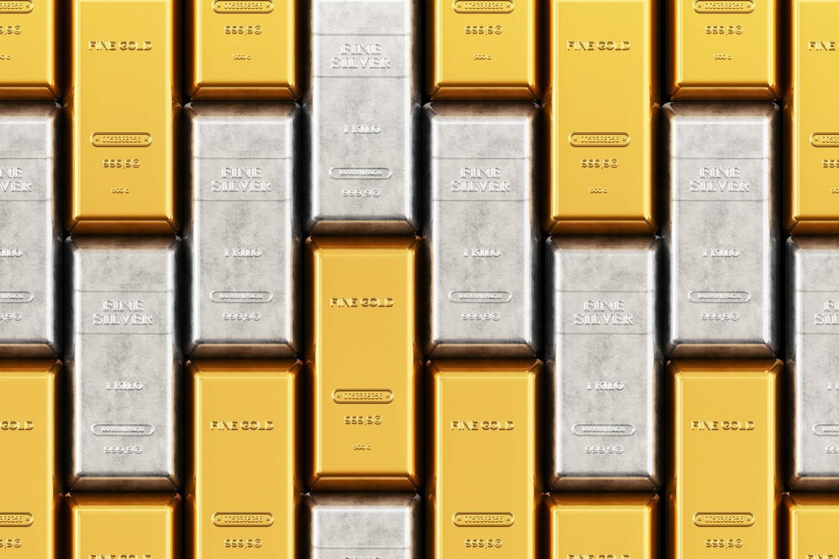 Gold prices fall while silver rise on commodity markets