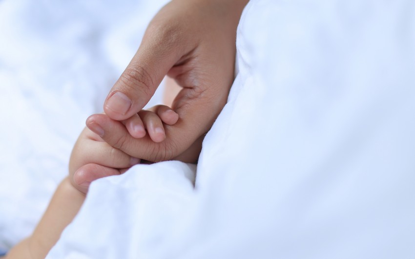 Newborn’s arm severed during delivery in India